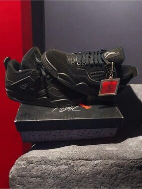 Jordan Men’s Sneakers in Black with Red Hang Tag Accent